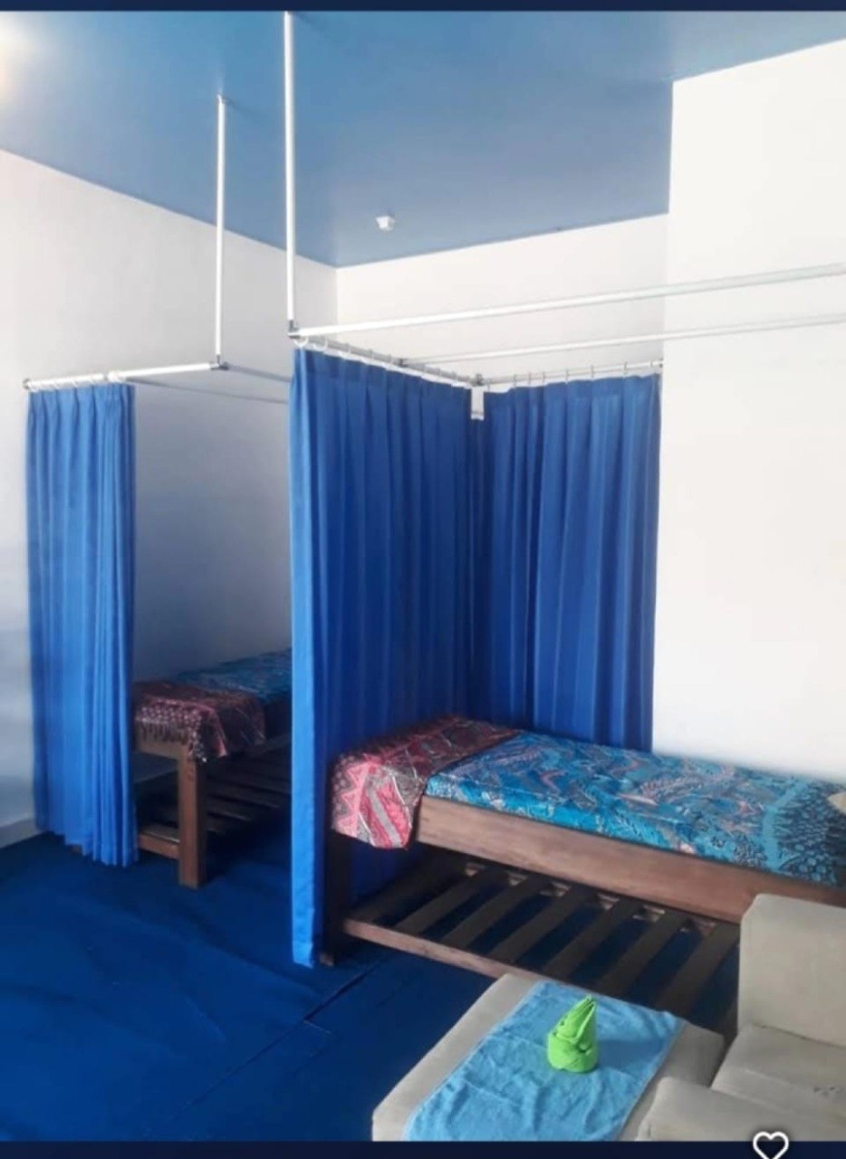 Area resepsionis Dejavu Spa dengan nuansa hangat